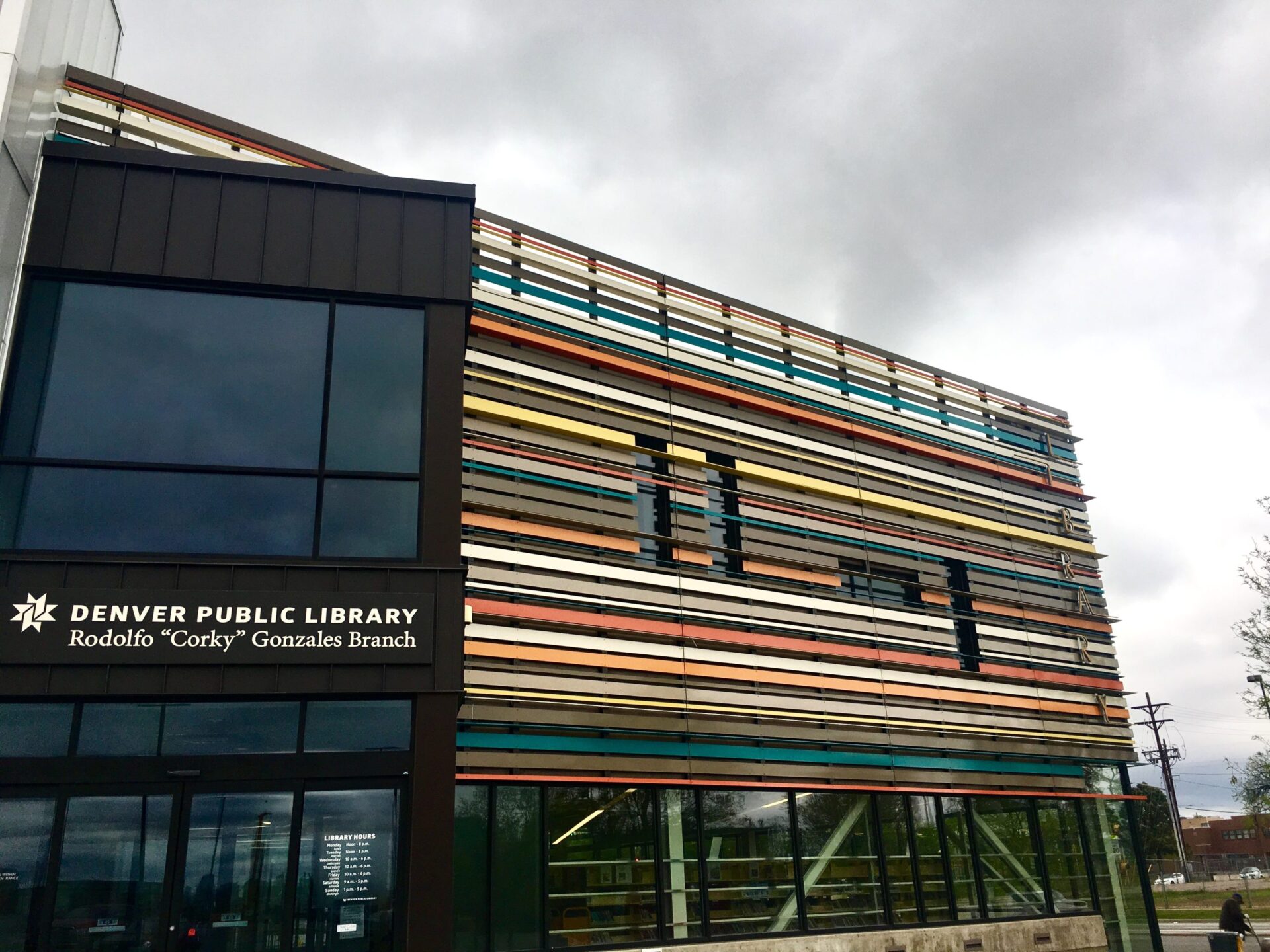 Front entrance of the Rodolfo "Corky" Gonzales Branch Library, a key community resource in Denver.