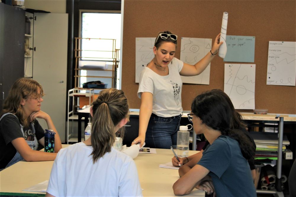 Artist Zaida Sever addresses a group of DSA students