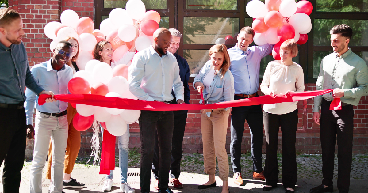 Ribbon Cutting group of nonprofit professionals